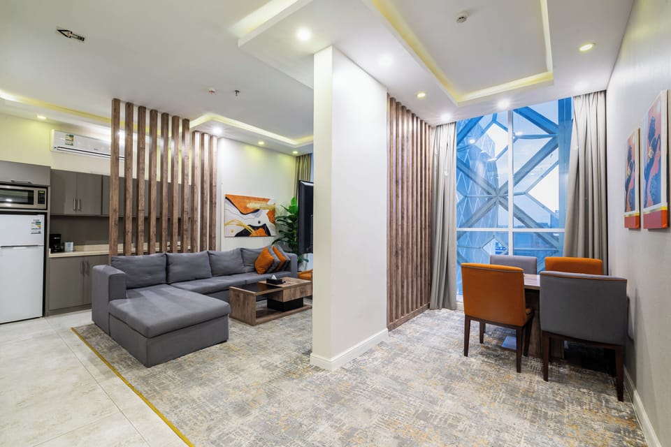 Apartment, 2 Bedrooms | Living area | 50-inch LCD TV with cable channels