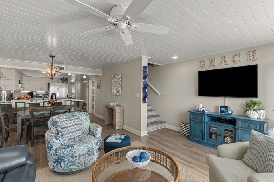 Bright and airy layout showing the staircase.
