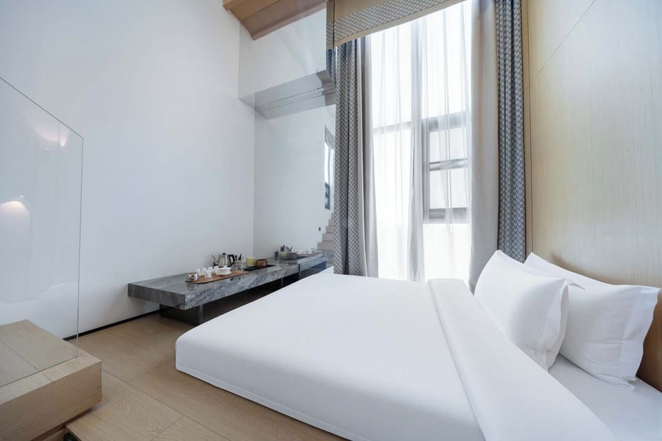 Family Duplex, City View | Premium bedding, down comforters, blackout drapes, soundproofing