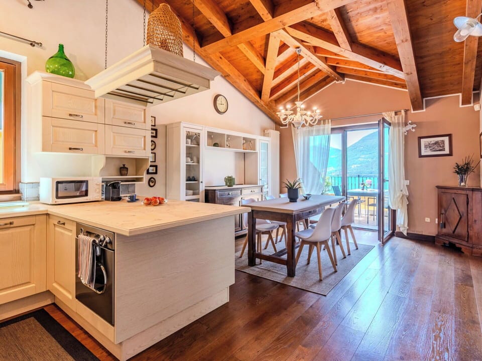 Furniture, Interior Design, Flooring, Wood, Floor, Ceiling, Kitchen, Chair, Light Fixture, Countertop