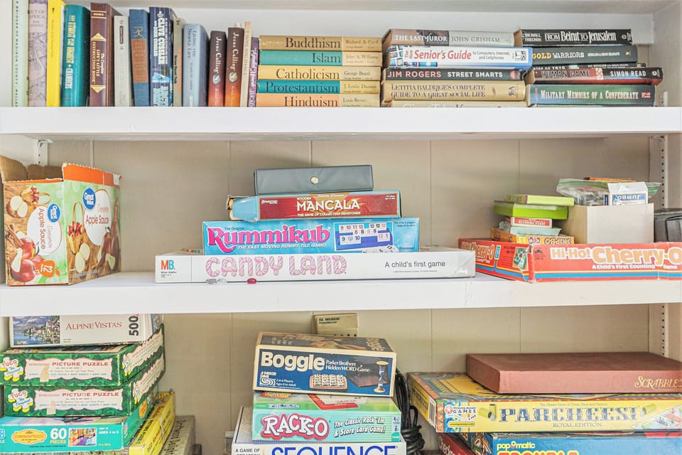 FAMILY ROOM:  The very comfy and relaxing family room, with a large streaming television and lots of books and games.