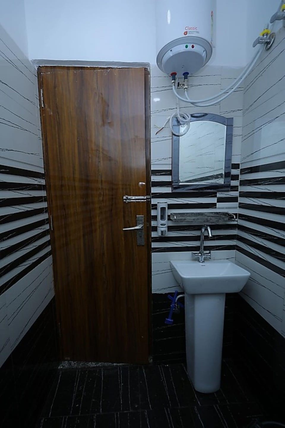 Shower, free toiletries, slippers, towels