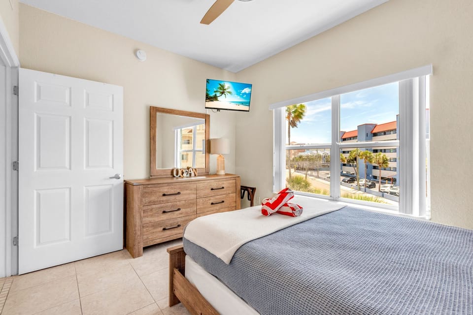 Guest Bedroom with Queen Bed and Smart TV