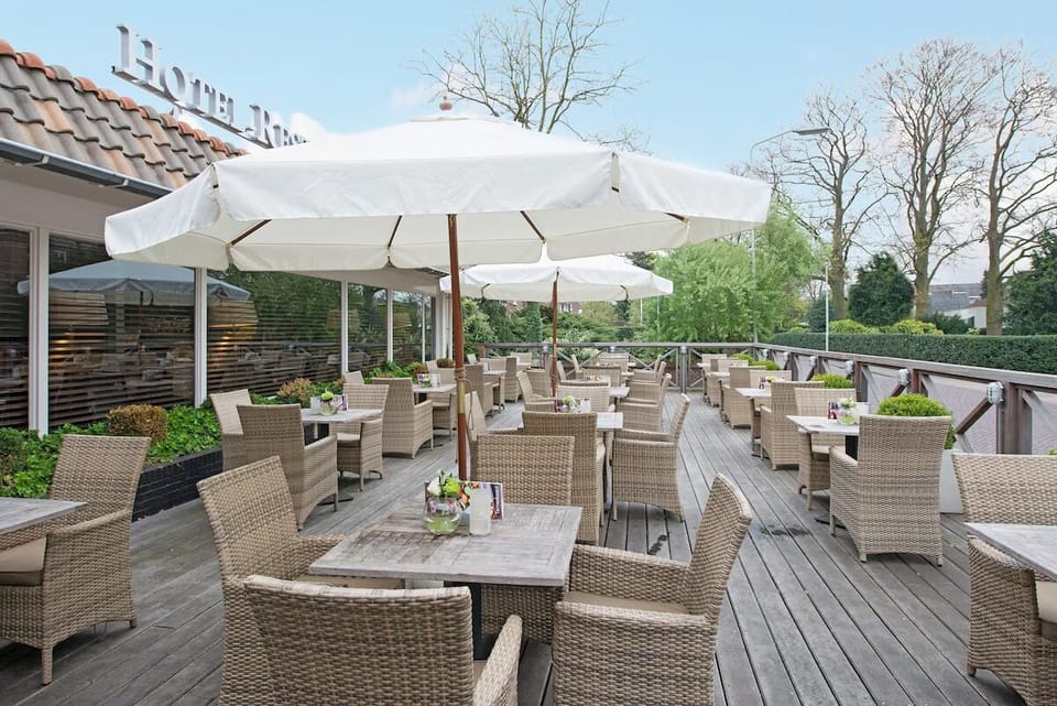 Linger over drinks on the spacious deck terrace seating.