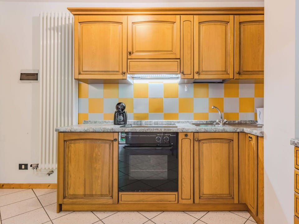 Kitchen, Countertop, Flooring, Wood, Yellow, Major Appliance, Interior Design, Kitchen Appliance, Floor, Cabinetry