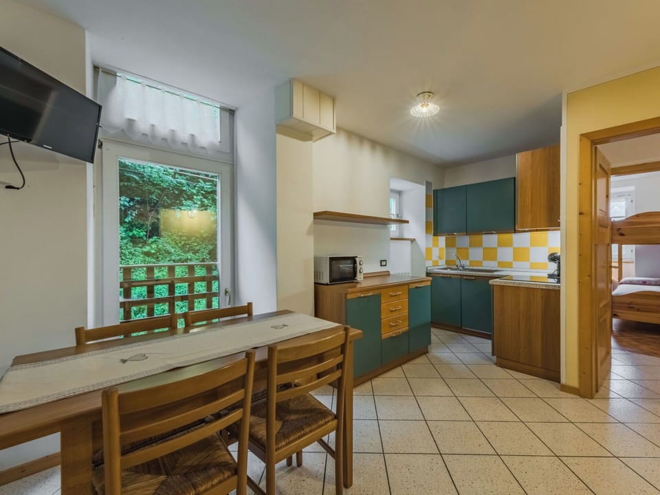 Ceiling, Interior Design, Flooring, Floor, Room, Apartment, Wood Stain, Kitchen & Dining Room Table, Chair, Hardwood