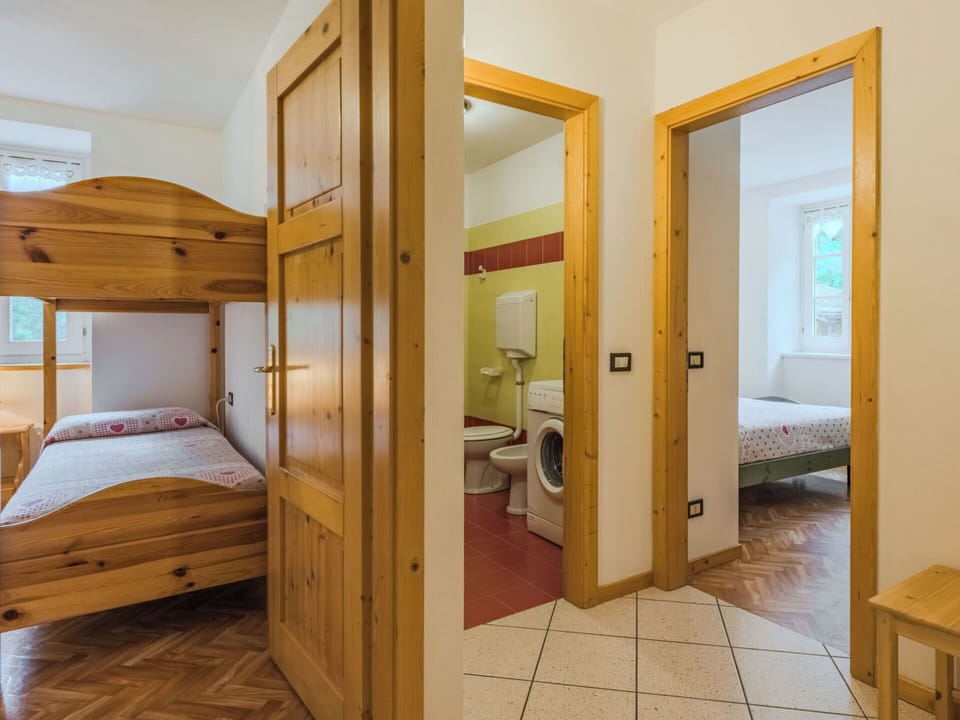 Wood, Bed, Bedroom, Floor, Interior Design, Ceiling, Flooring, Furniture, Room, Bed Sheet