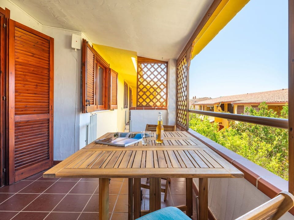 Wood, Interior Design, Ceiling, Wood Stain, Shade, Hardwood, Balcony, Chair, Design, Varnish