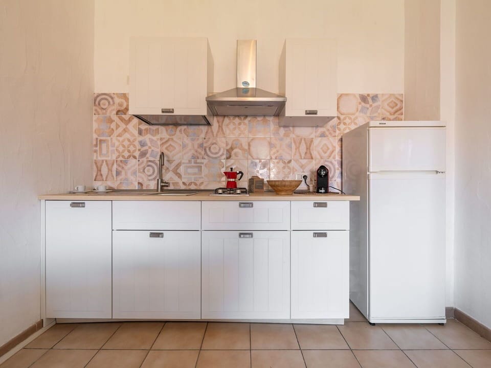 Kitchen, Countertop, Kitchen Appliance, Cabinetry, Major Appliance, Flooring, Interior Design, Kitchen Sink, Floor, Cupboard