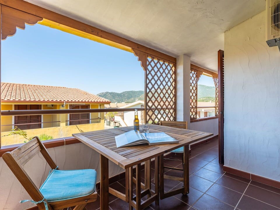 Wood, Ceiling, Interior Design, Wood Stain, Balcony, Apartment, Shade, Hardwood, Chair, Kitchen & Dining Room Table