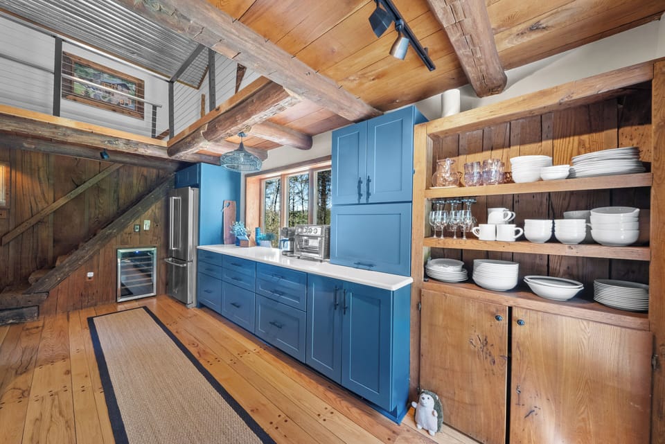 Modern Kitchen with Custom Cabinets, Beverage Chiller, and Stainless Appliances