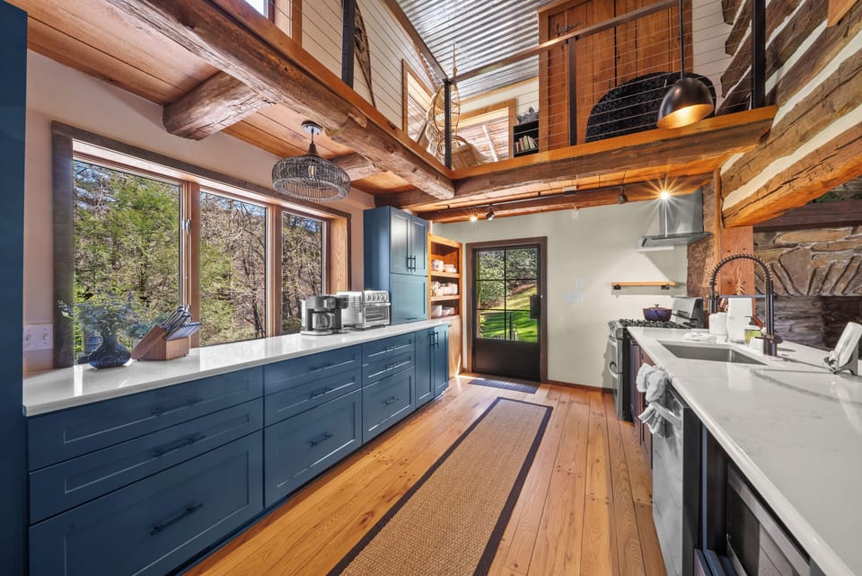 Spacious Kitchen with Custom Touches and Loft Above