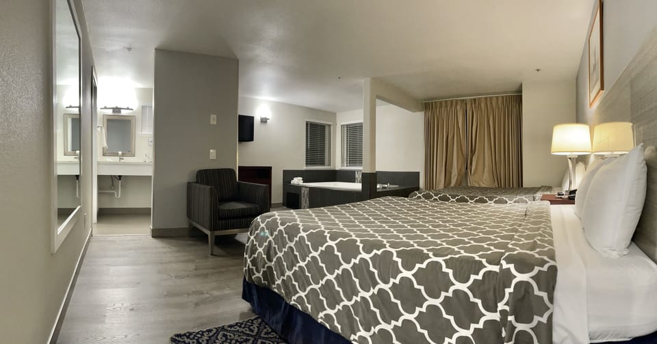 Basic Double Room, 2 Queen Beds, Non Smoking, Jetted Tub | Iron/ironing board, free WiFi, bed sheets