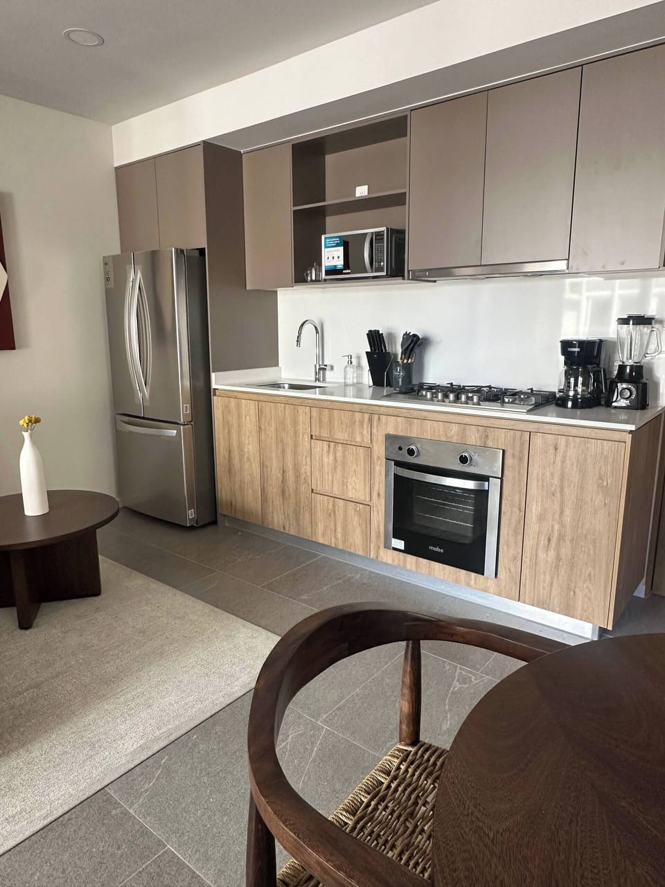 Full-size fridge, microwave, oven, cookware/dishes/utensils
