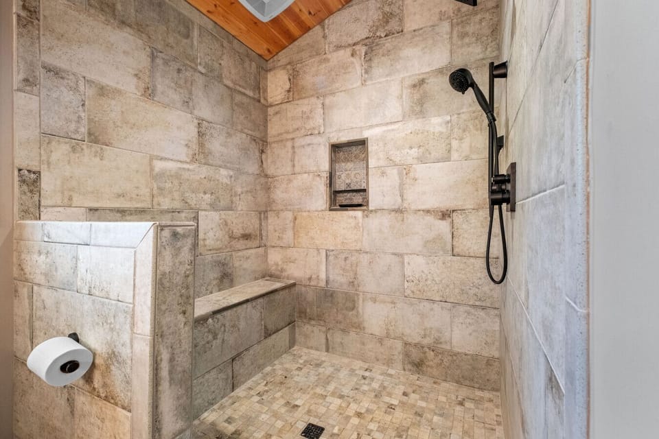 Master Bathroom shower with tile bench