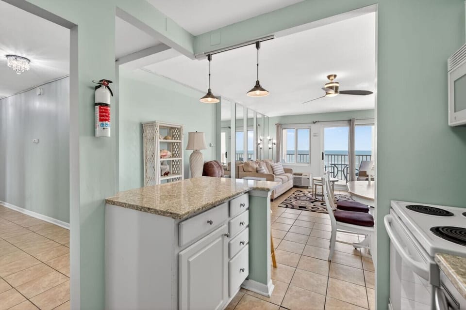 An open layout keeps everyone connected—from cooking to relaxing with ocean views in sight