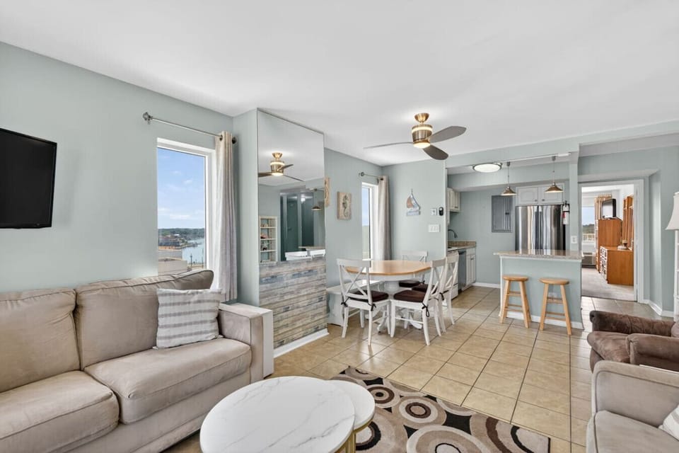 Step into a bright, open space where relaxing, dining, and coastal living come together effortlessly