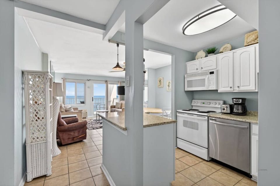 Cook, chat, and stay part of the moment with this seamless open-concept design