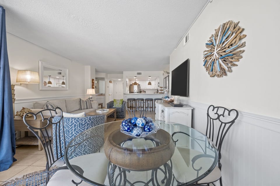 Thoughtful coastal decor and natural light create a calm and inviting atmosphere