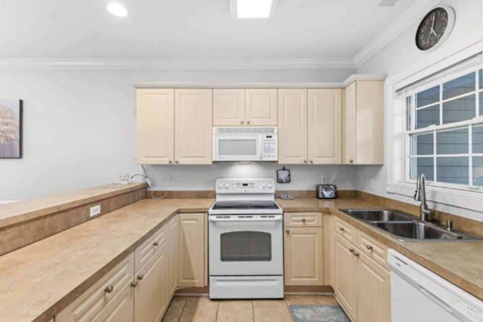 Cook, gather, and enjoy the convenience of this spacious fully equipped kitchen, designed to make meals easy during your stay. Featuring ample counter space, full-size appliances, plenty of cabinet storage, and everything you need to prepare breakfast bef