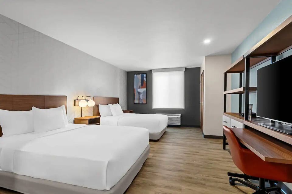 Wake up refreshed in a spacious room with warm modern finishes.