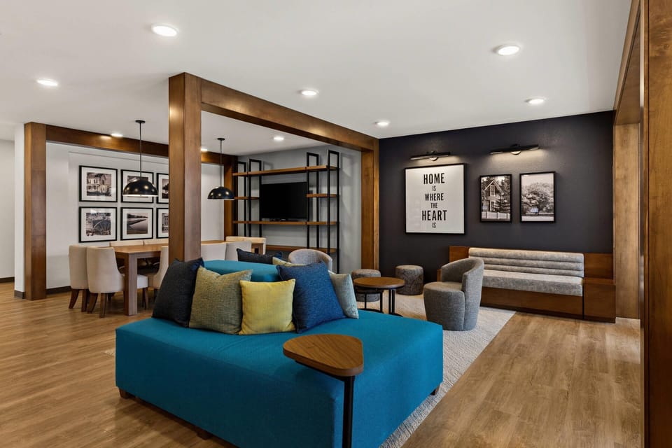 Relax together in stylish seating with warm, modern vibes.