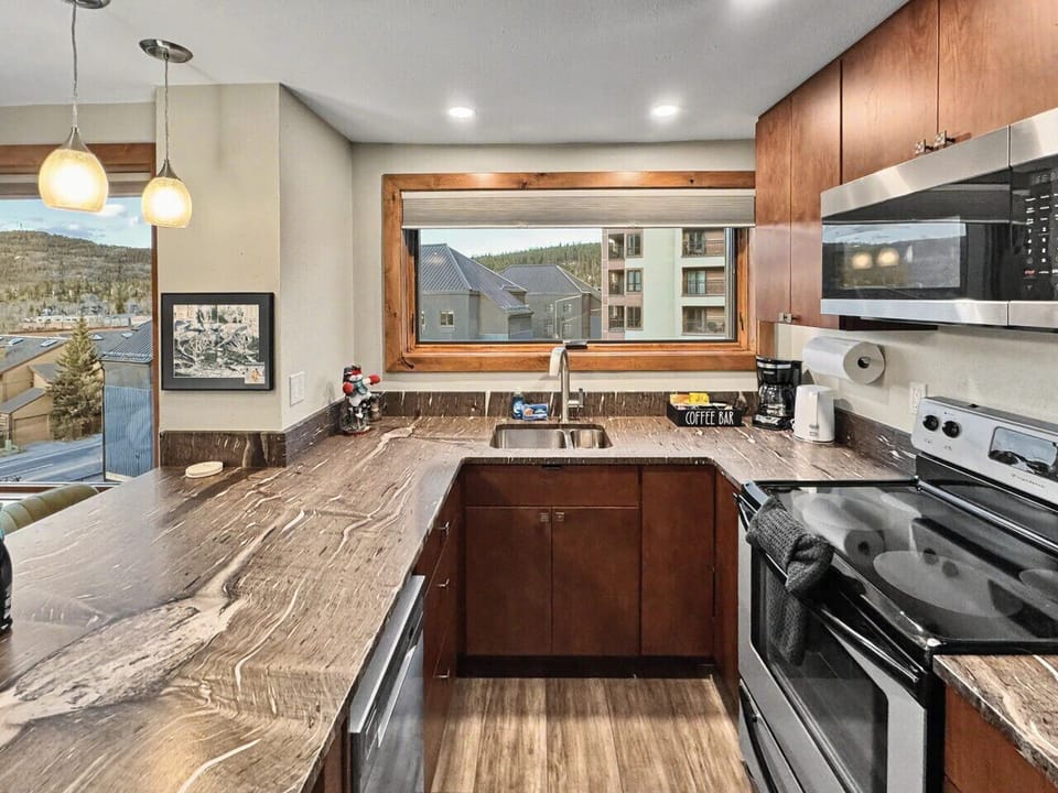 Fully Stocked Kitchen with Large Bar