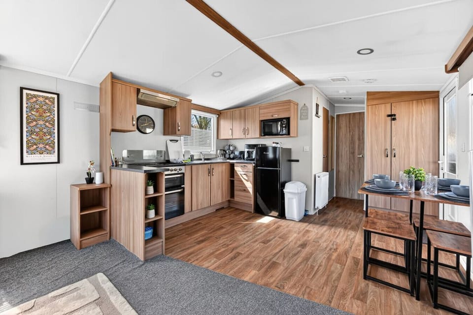 Open plan living, dining and kitchen area.