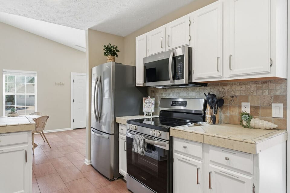 Brand new top of the line stainless steel appliances throughout.