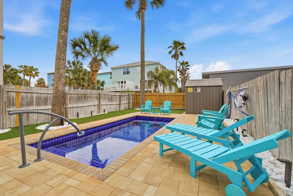 Lounge in the sun next to your private pool