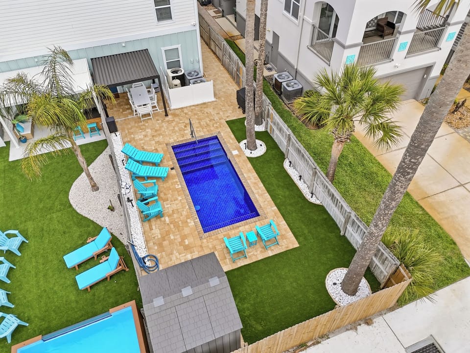 Overhead view of the pool and backyard