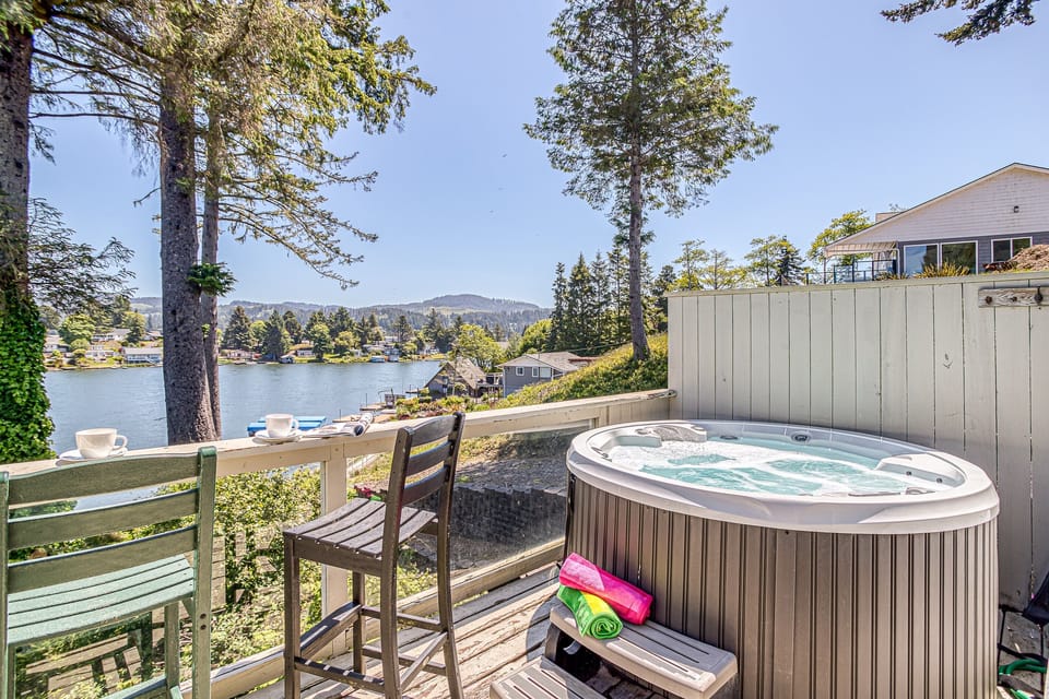 Hot Tub Retreat: Soak in luxury with stunning lake views and tranquil surroundings!