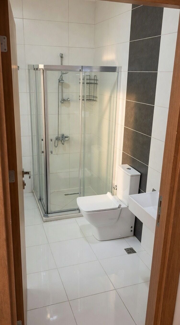 Deluxe Room, City View | Bathroom | Hair dryer, slippers, towels, soap