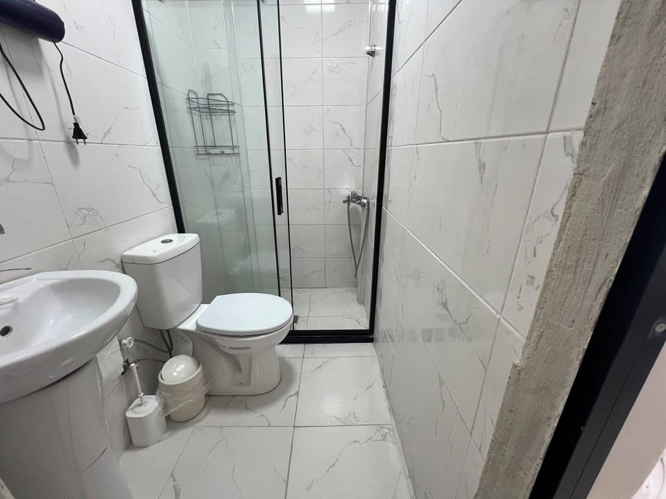 Standard Room | Bathroom | Hair dryer, slippers, towels, soap