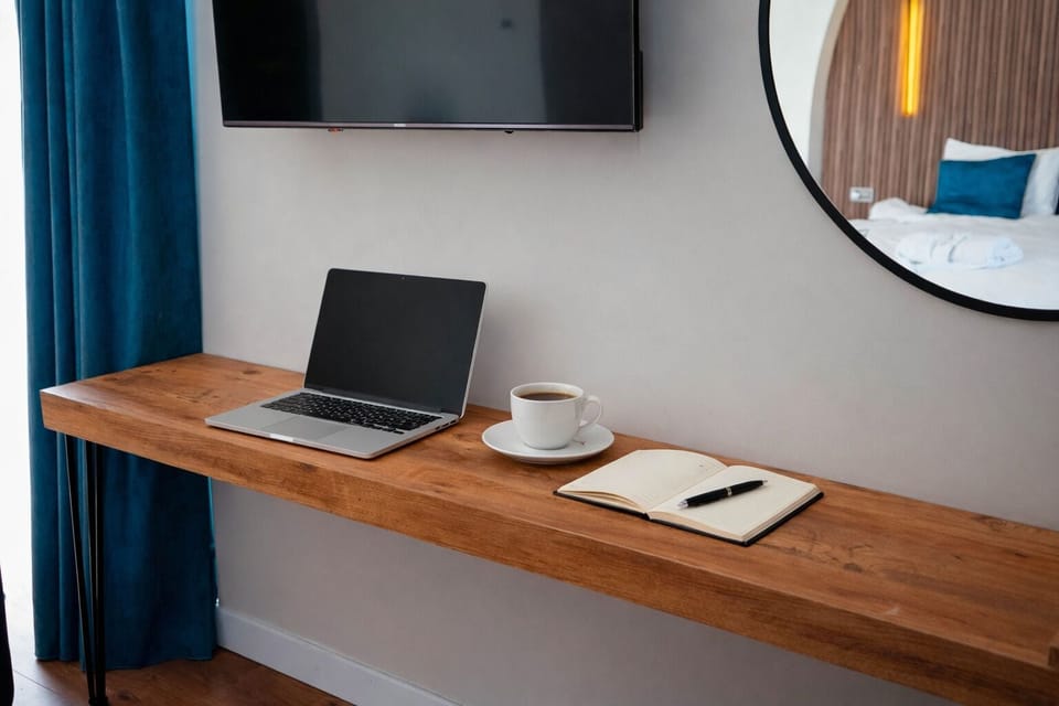 Desk, laptop workspace, blackout drapes, free WiFi