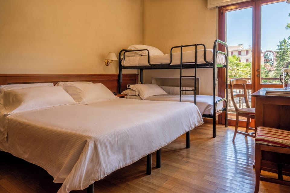 Classic Quadruple Room | In-room safe, desk, soundproofing