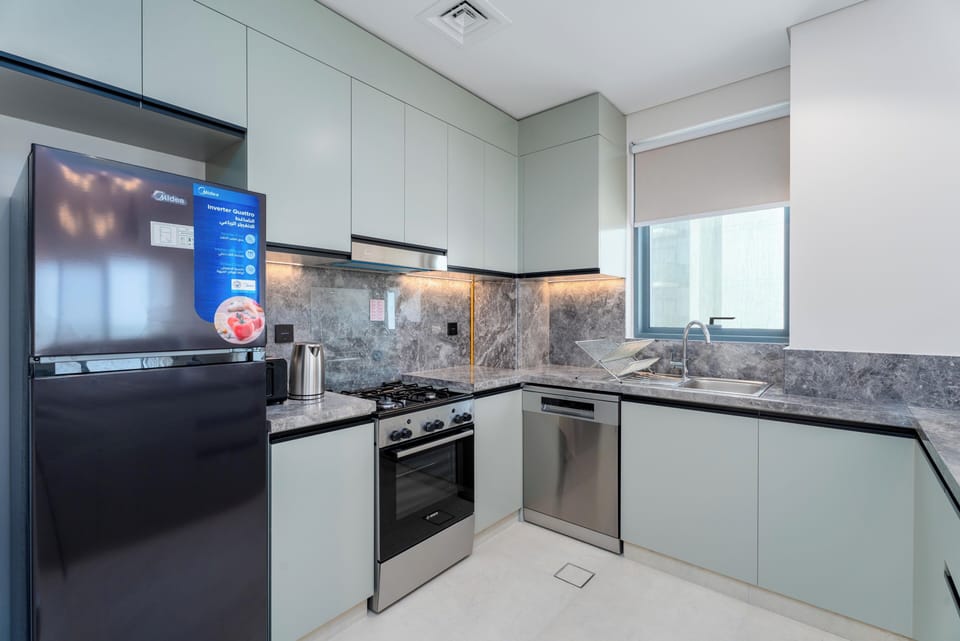 Comfort Apartment, 2 Bedrooms, Balcony, Golf View | Private kitchen | Toaster, eco-friendly cleaning products, dining tables