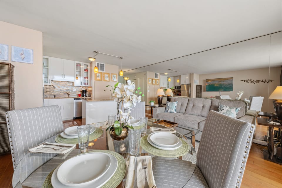 Bright, open, and airy interiors seamlessly connect the gourmet kitchen to your private view of paradise.