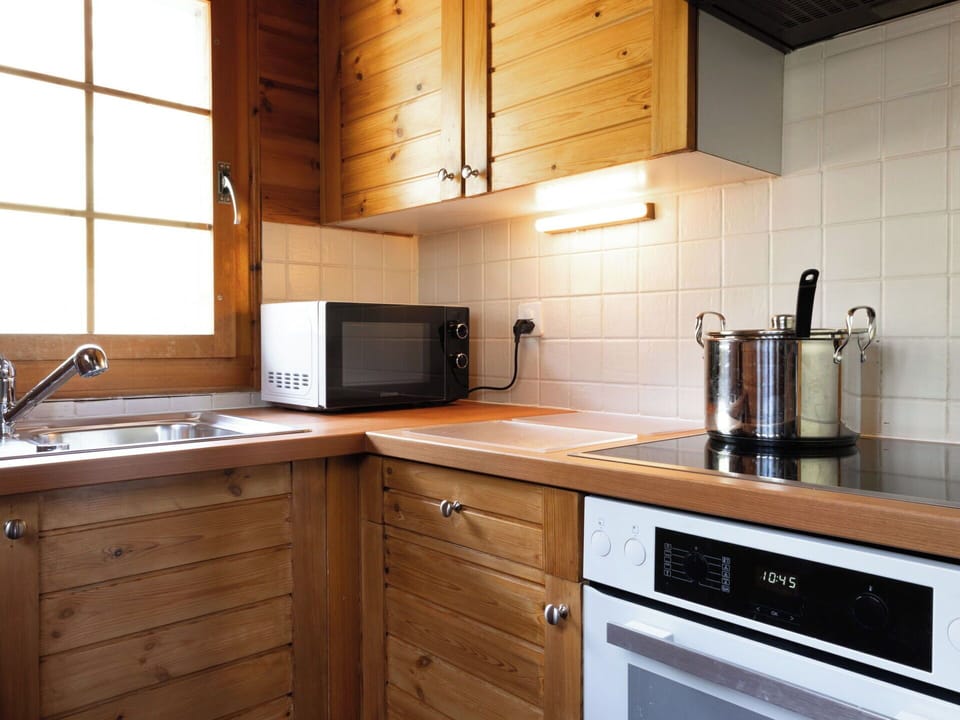 Kitchen, Cabinetry, Countertop, Kitchen Appliance, Furniture, Major Appliance, Wood, Sink, Kitchen Sink, Plumbing Fixture
