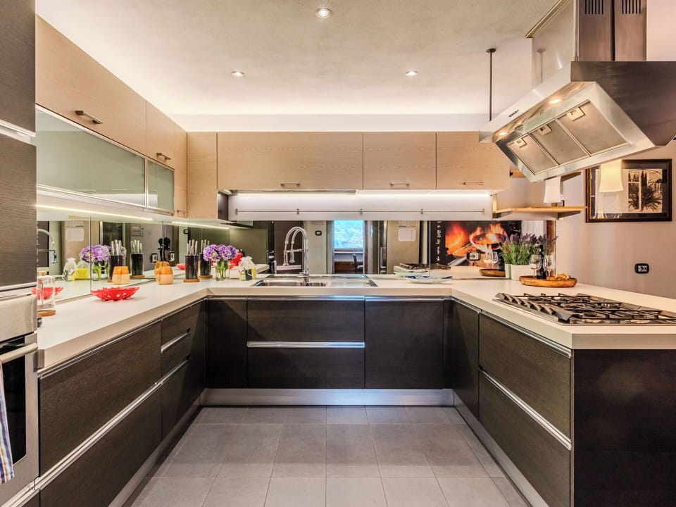 Kitchen, Countertop, Kitchen Appliance, Major Appliance, Interior Design, Kitchen Stove, Cabinetry, Flooring, Ceiling, Lighting