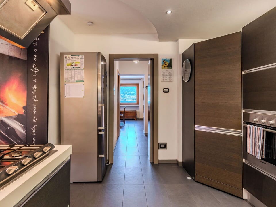 Kitchen, Interior Design, Countertop, Major Appliance, Kitchen Appliance, Flooring, Furniture, Wood, Ceiling, Floor