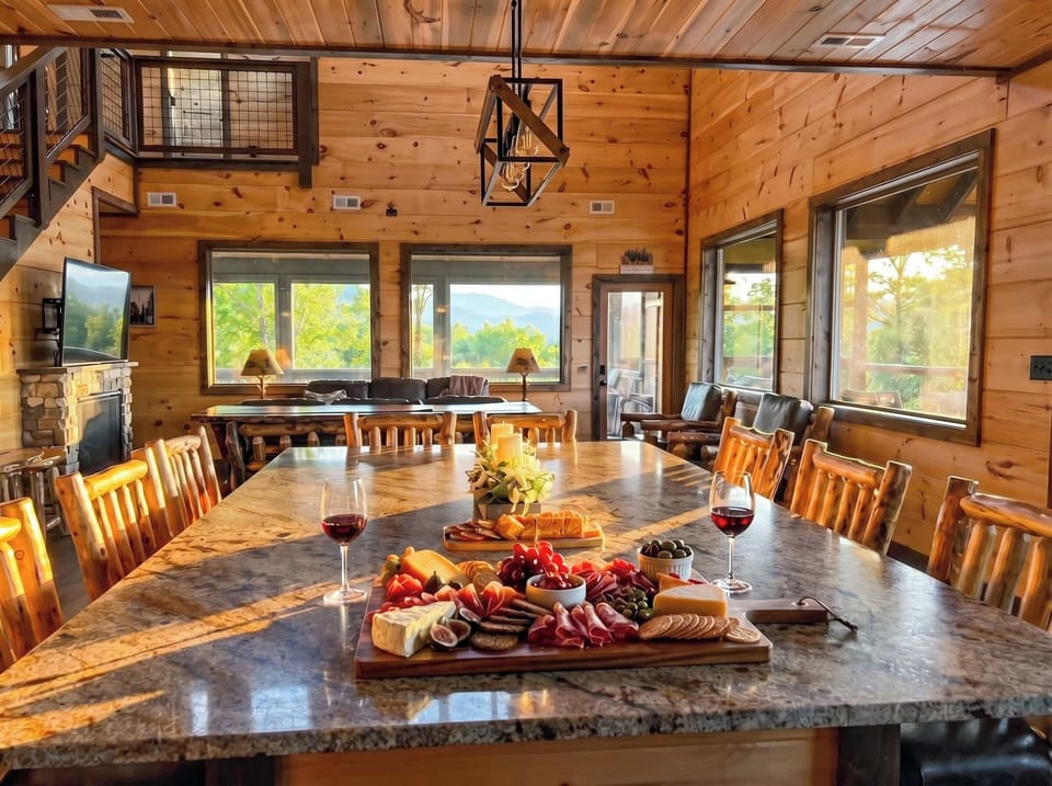 Large dining table beside mountain views, perfect for memorable group dinners