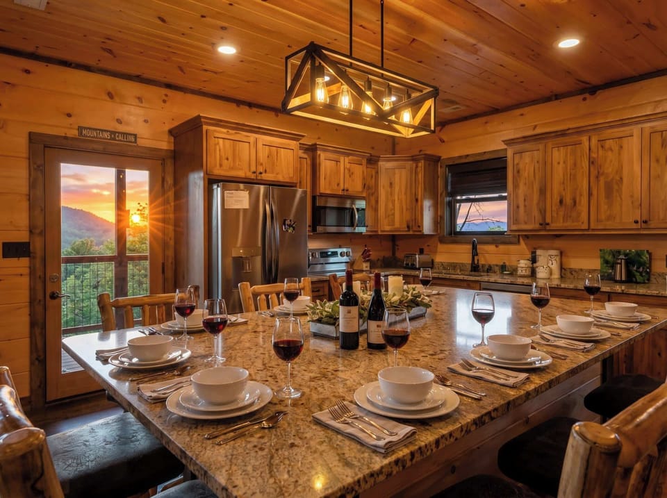 Rustic kitchen w/ stone counters, warm wood finishes & room to gather together