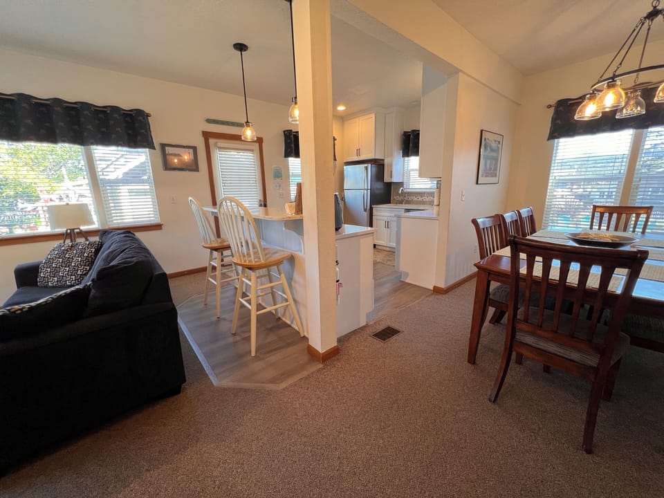 Experience this remarkable upside-down living space where chairs defy gravity on the ceiling while you relax below in this uniquely playful retreat.
