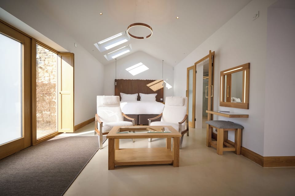 Suite | Desk, laptop workspace, blackout drapes, iron/ironing board