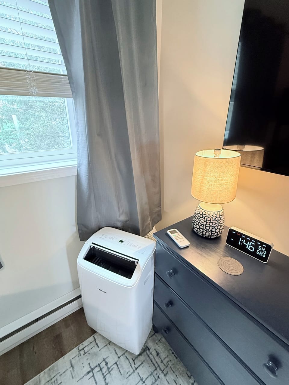 Portable AC unit is installed for the summer months as needed