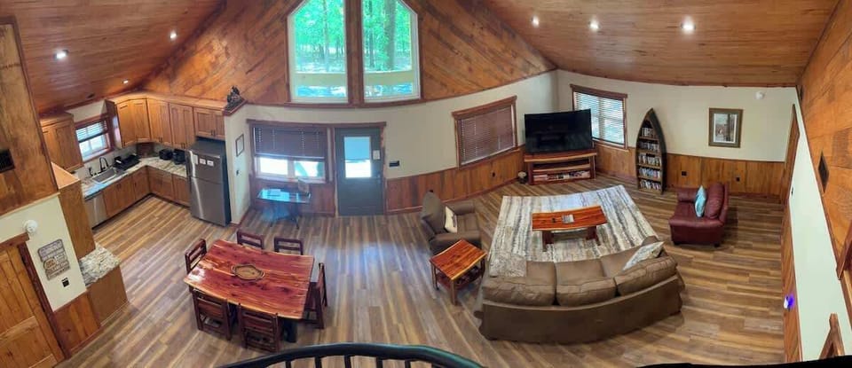 Open concept living room, dining area and kitchen.  