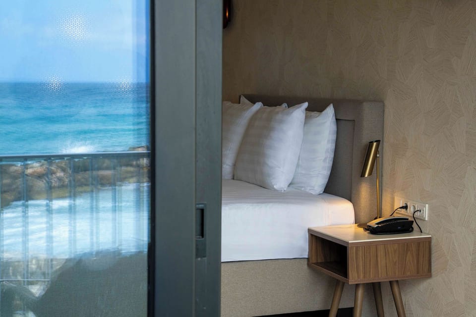 Deluxe Room, Oceanfront (Blues) | In-room safe, desk, blackout drapes, iron/ironing board