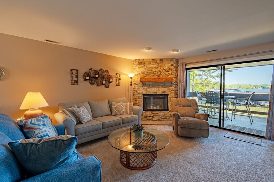 Living room looking out to lake and balcony