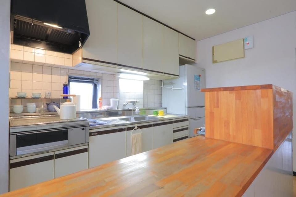 Fridge, microwave, stovetop, cookware/dishes/utensils